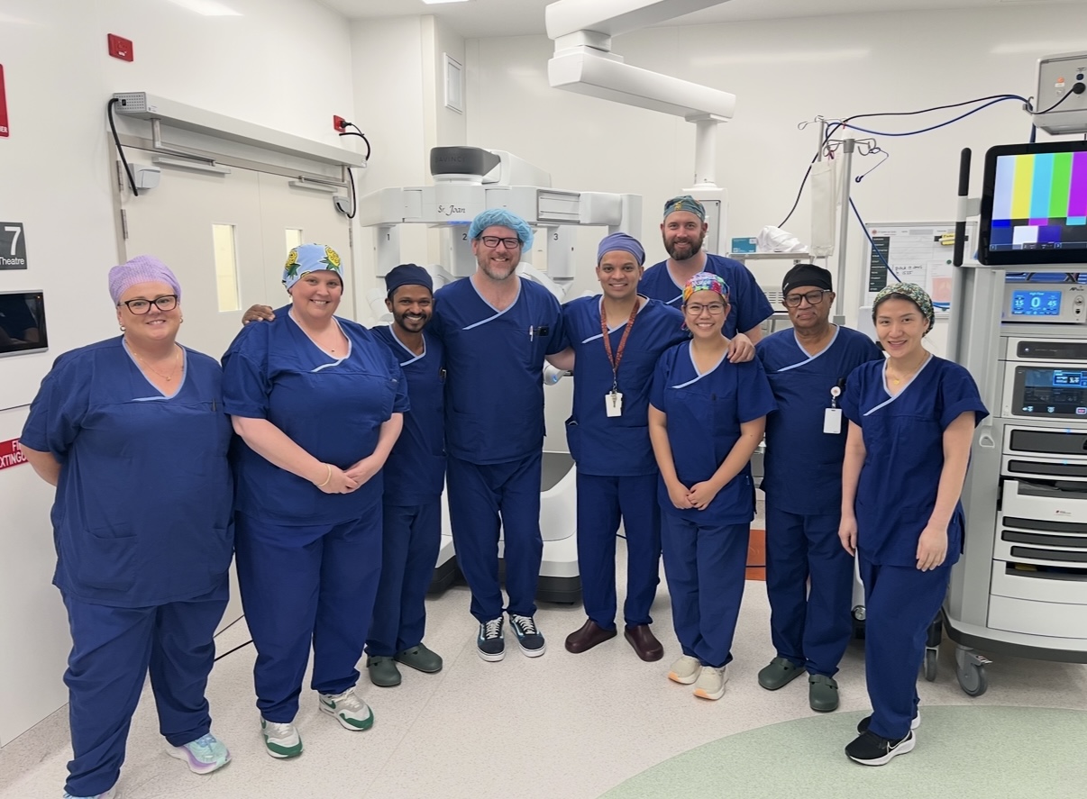 Medical team in hospital operating room.